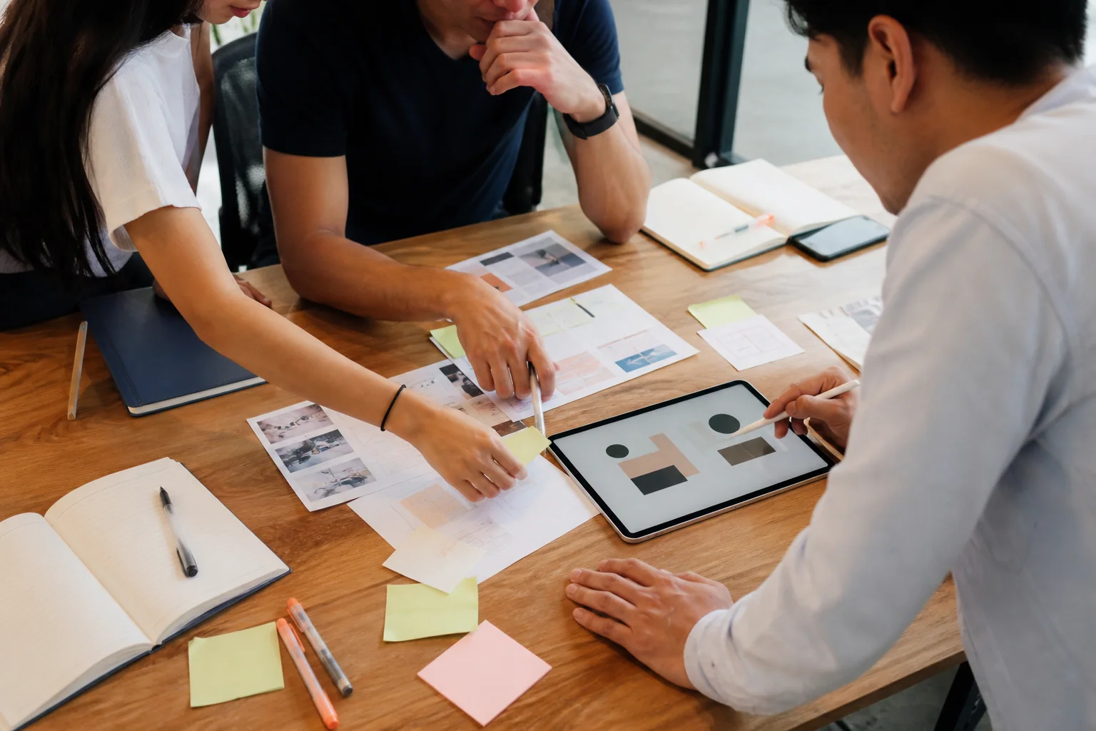 Startup team reviewing prototype and market-validation evidence
